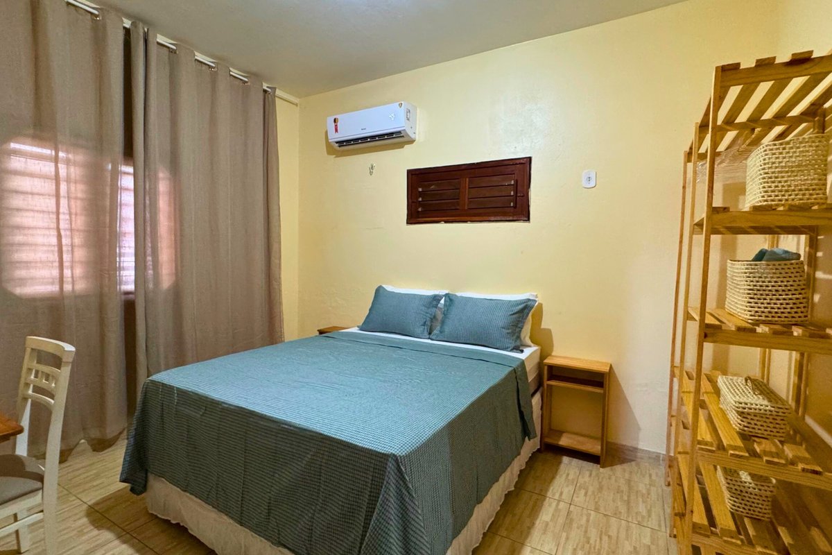 Quarto de casal com ar-condicionado